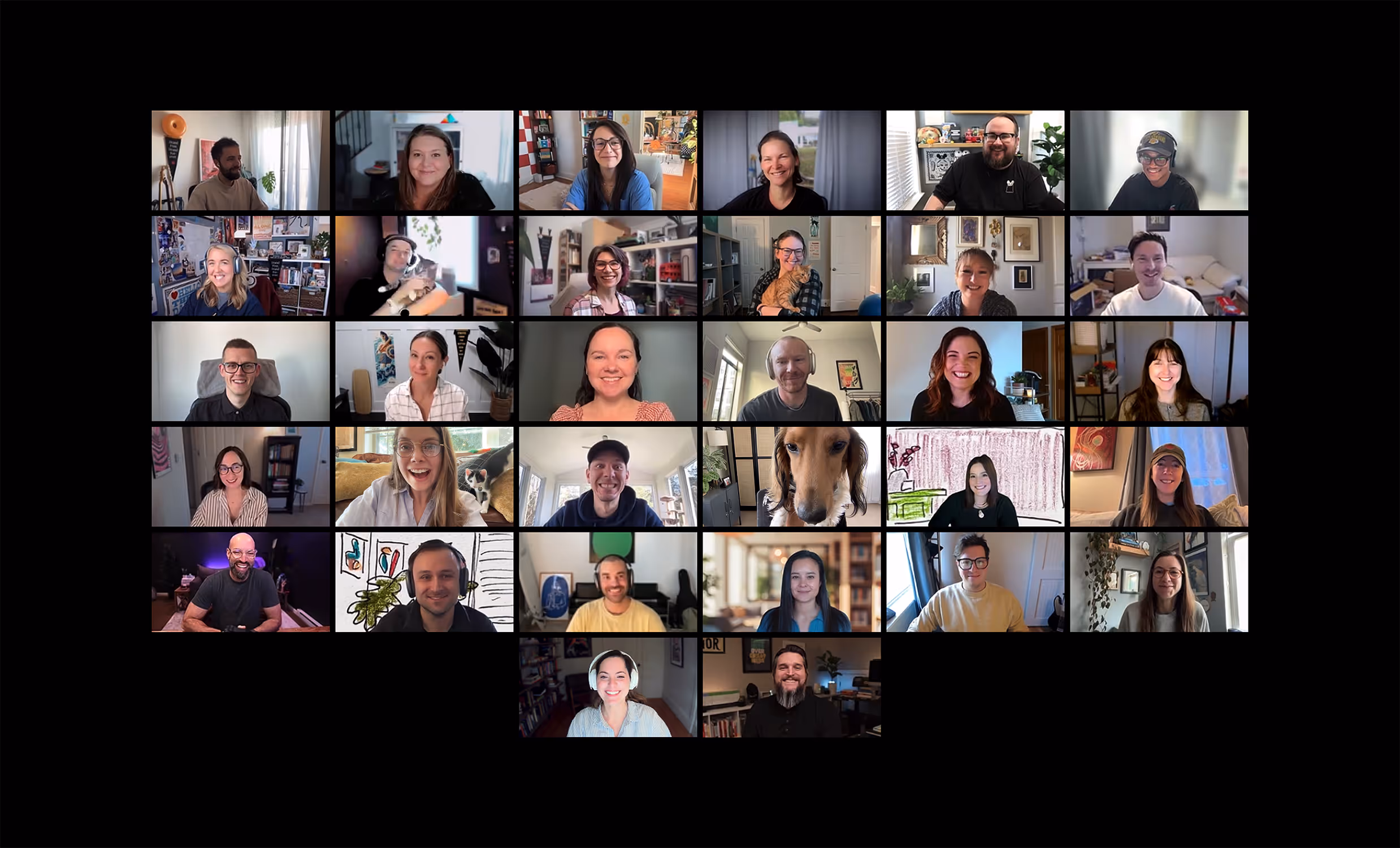 A Zoom video conference screen with 32 participants, some smiling, including two pets, a cat and a dog.
